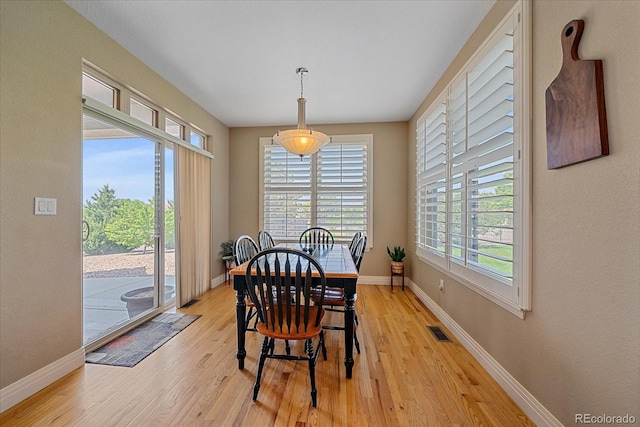 8655 E 130th Ave, Thornton, CO 80602 - dining room with light wood-style floors and baseboards