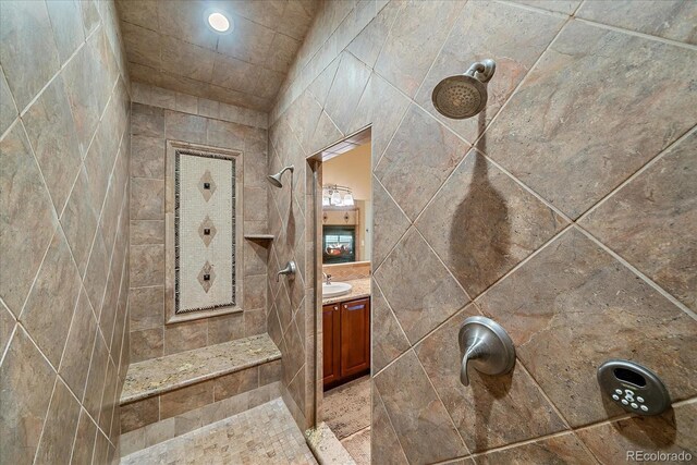 8655 E 130th Ave, Thornton, CO 80602 - full bath featuring tiled shower and vanity