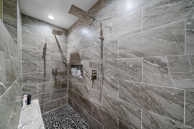 8655 E 130th Ave, Thornton, CO 80602 - full bath with tiled shower and recessed lighting