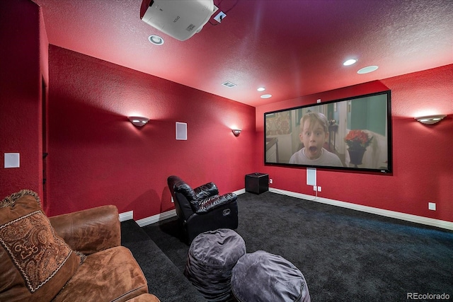 8655 E 130th Ave, Thornton, CO 80602 - home theater room featuring carpet flooring, a textured ceiling, baseboards, a textured wall, and recessed lighting