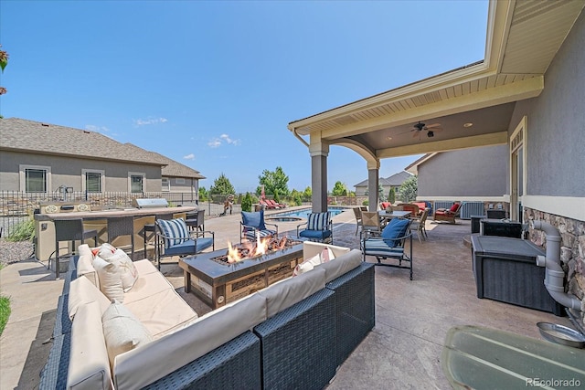 8655 E 130th Ave, Thornton, CO 80602 - view of patio with an outdoor living space with a fire pit and ceiling fan