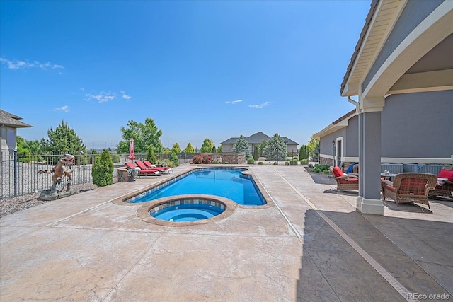 8655 E 130th Ave, Thornton, CO 80602 - view of swimming pool with a patio area, an outdoor living space, and a pool with connected hot tub