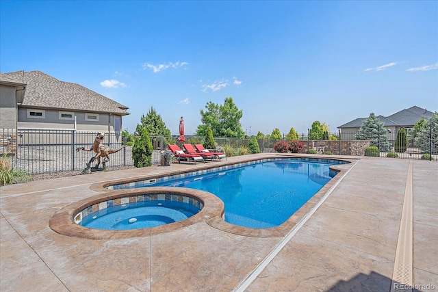 8655 E 130th Ave, Thornton, CO 80602 - view of pool featuring a patio area and a pool with connected hot tub