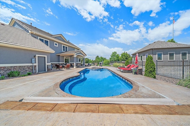 8655 E 130th Ave, Thornton, CO 80602 - view of pool featuring a patio area and a pool with connected hot tub