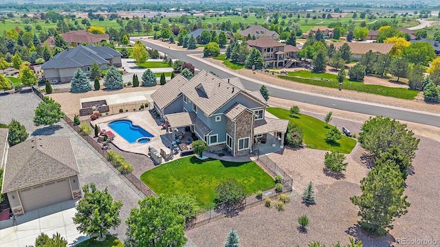8655 E 130th Ave, Thornton, CO 80602 - aerial view of property and surrounding area featuring a pool