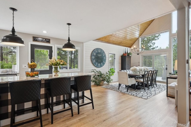 7312 Marshall Rd, Larkspur, CO 80118 - dining area with light wood finished floors, high vaulted ceiling, a chandelier, wood ceiling, and recessed lighting