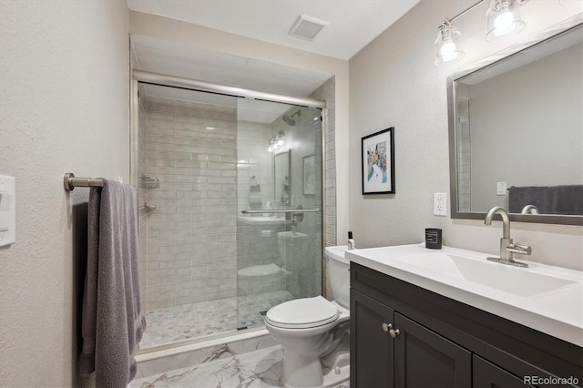 7312 Marshall Rd, Larkspur, CO 80118 - full bath featuring vanity, marble finish floors, and a shower stall