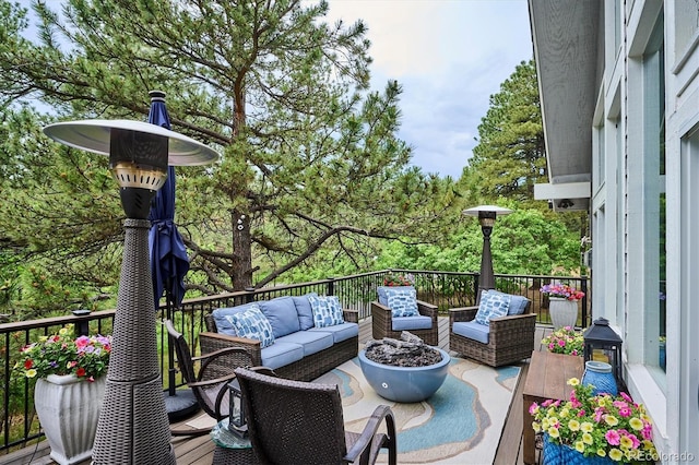 7312 Marshall Rd, Larkspur, CO 80118 - wooden deck featuring an outdoor hangout area