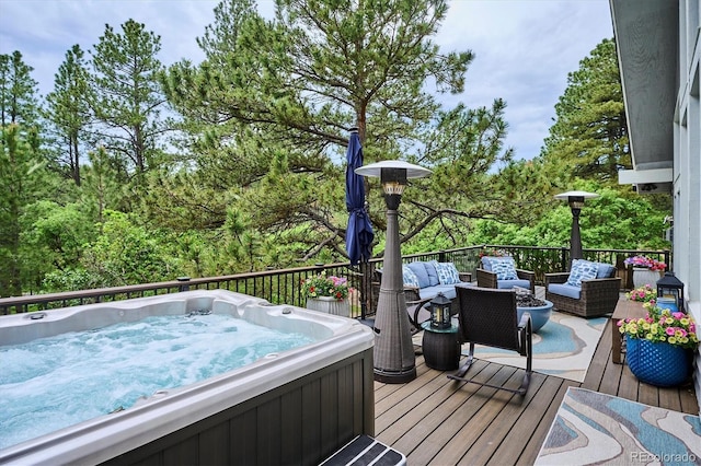 7312 Marshall Rd, Larkspur, CO 80118 - deck featuring a hot tub and an outdoor living space