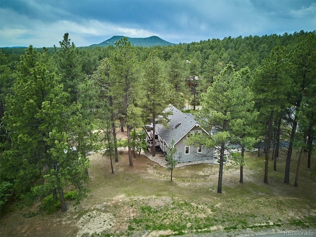 7312 Marshall Rd, Larkspur, CO 80118 - view from above of property with a forest and a mountain backdrop