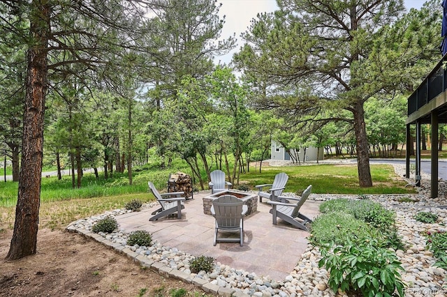 7312 Marshall Rd, Larkspur, CO 80118 - view of patio with a fire pit