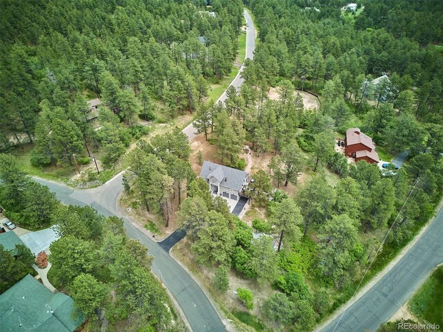 7312 Marshall Rd, Larkspur, CO 80118 - aerial overview of property's location featuring a heavily wooded area