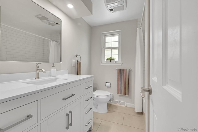full bath with radiator, tile patterned floors, vanity, toilet, and baseboards
