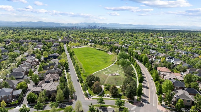 652 Ulster Way, Denver, CO 80230 - aerial perspective of suburban area featuring a mountain backdrop