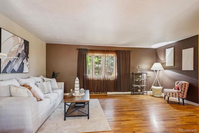 3871 W Saratoga Ave, Littleton, CO 80123 - living area featuring wood finished floors and baseboards