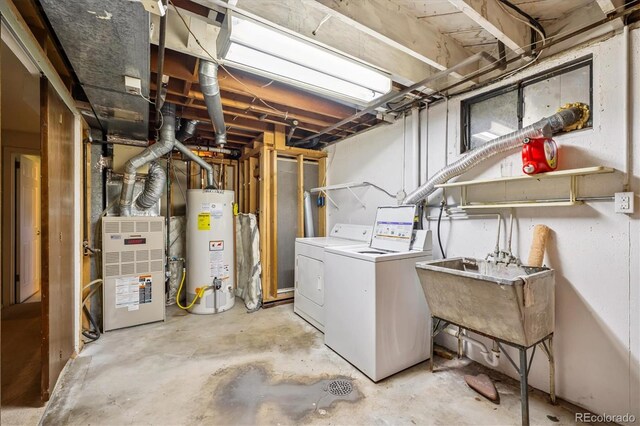 3871 W Saratoga Ave, Littleton, CO 80123 - unfinished below grade area featuring water heater, separate washer and dryer, and heating unit