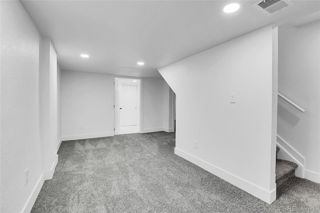 additional living space featuring carpet flooring