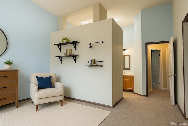 5555 E Briarwood Ave Unit 706, Centennial, CO 80122 - sitting room with light colored carpet and baseboards