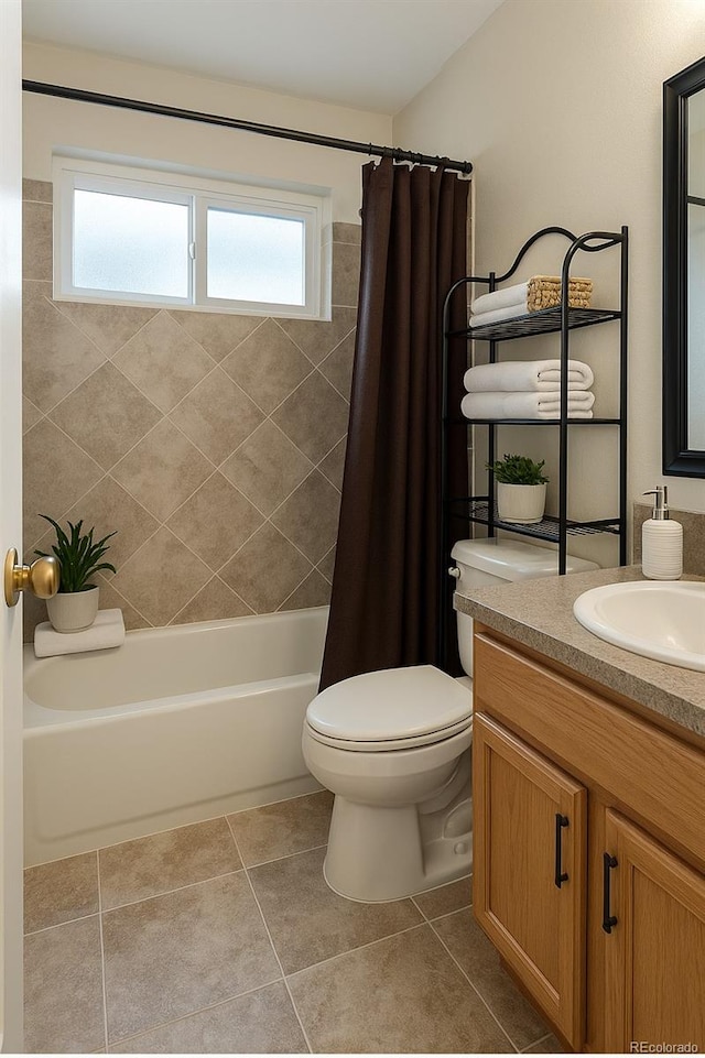 5555 E Briarwood Ave Unit 706, Centennial, CO 80122 - bathroom featuring toilet, vanity, shower / bath combination with curtain, and tile patterned floors