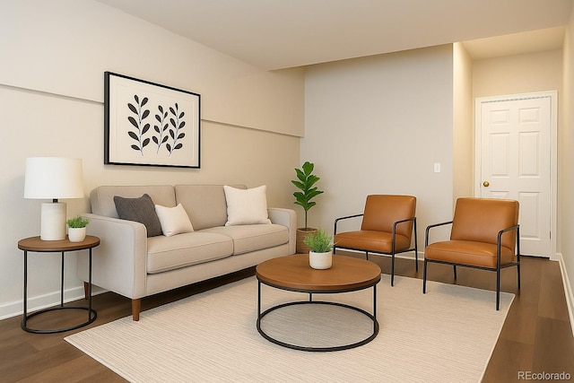 5555 E Briarwood Ave Unit 706, Centennial, CO 80122 - living area with dark wood-style flooring and baseboards