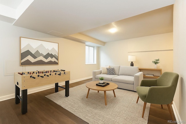 5555 E Briarwood Ave Unit 706, Centennial, CO 80122 - living area with dark wood-style floors and baseboards