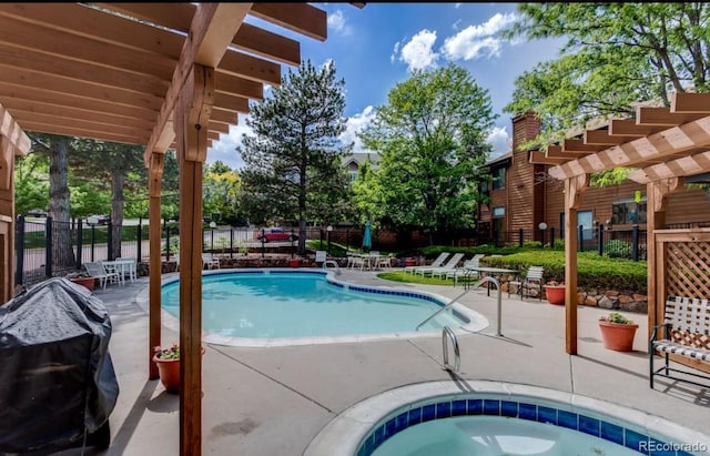 5555 E Briarwood Ave Unit 706, Centennial, CO 80122 - community pool featuring a patio, fence, a pergola, and grilling area