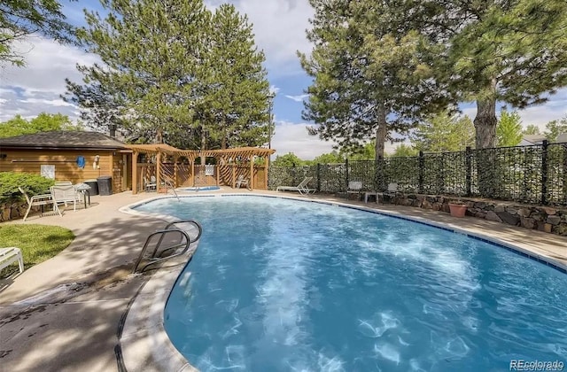 5555 E Briarwood Ave Unit 706, Centennial, CO 80122 - view of swimming pool with fence and a patio