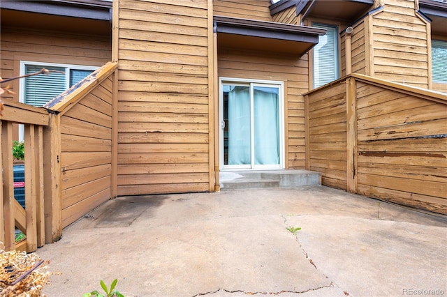 5555 E Briarwood Ave Unit 706, Centennial, CO 80122 - view of exterior entry with a patio