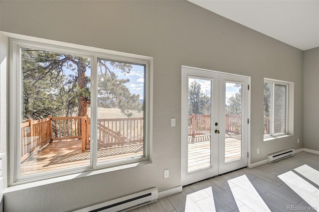 doorway to outside with french doors, a healthy amount of sunlight, and a baseboard heating unit