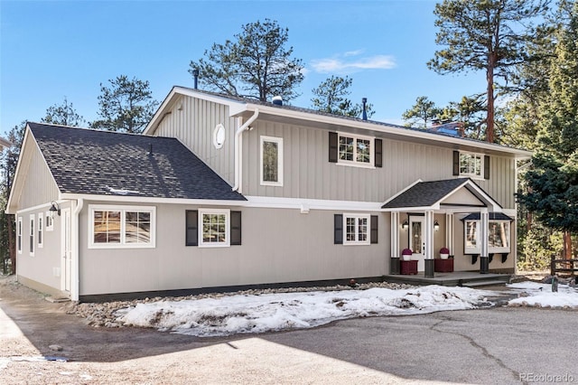 view of front of property with roof with shingles