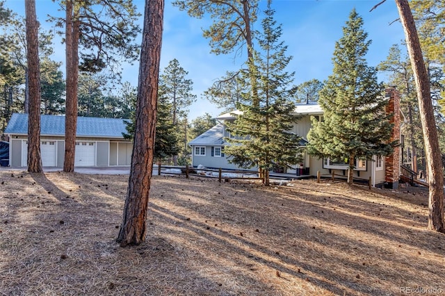 view of yard featuring an attached garage