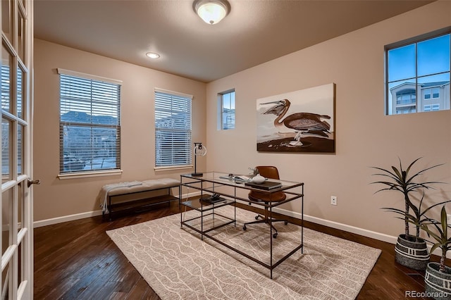 office with recessed lighting, dark wood-style flooring, a healthy amount of sunlight, and baseboards