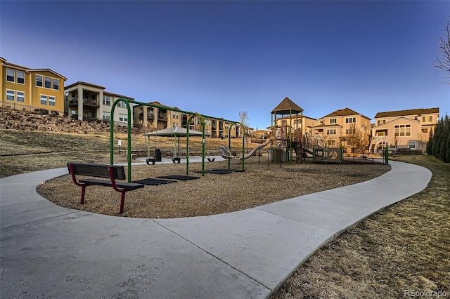 community playground featuring a residential view