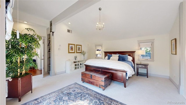 carpeted bedroom featuring a notable chandelier, visible vents, baseboards, and lofted ceiling