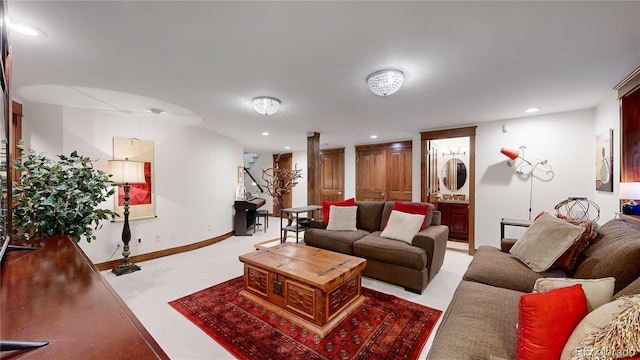 living room with recessed lighting and carpet flooring