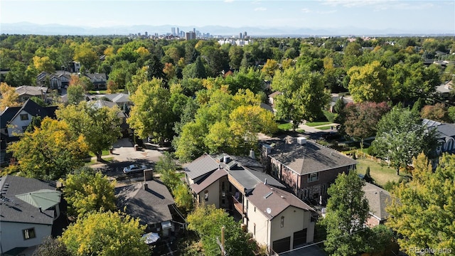birds eye view of property with a residential view