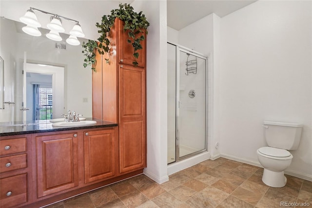 17442 Nature Walk Trl Unit 107, Parker, CO 80134 - full bathroom featuring a shower stall, vanity, and stone finish flooring