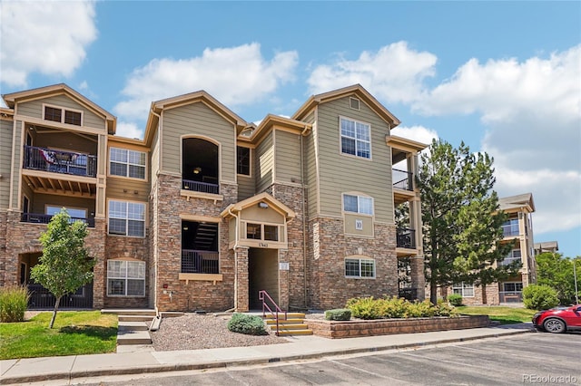 17442 Nature Walk Trl Unit 107, Parker, CO 80134 - view of property with uncovered parking