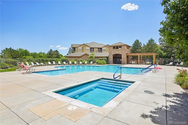 17442 Nature Walk Trl Unit 107, Parker, CO 80134 - community pool featuring a hot tub, a patio area, and a pergola