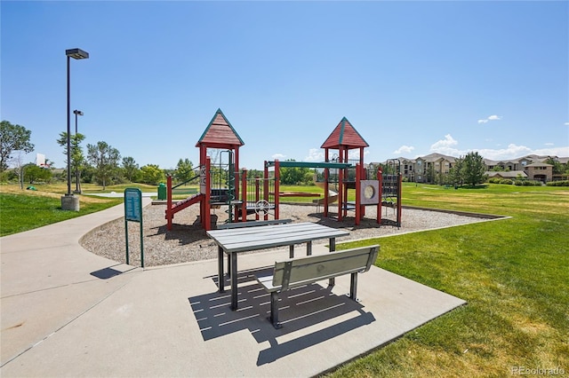 17442 Nature Walk Trl Unit 107, Parker, CO 80134 - communal playground featuring a yard