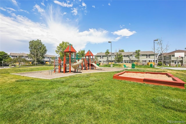 17442 Nature Walk Trl Unit 107, Parker, CO 80134 - community jungle gym featuring a lawn and a residential view
