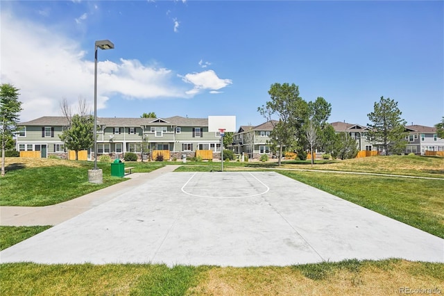 17442 Nature Walk Trl Unit 107, Parker, CO 80134 - view of sport court featuring community basketball court, a lawn, and a residential view