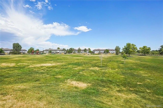 17442 Nature Walk Trl Unit 107, Parker, CO 80134 - view of grassy yard with a residential view