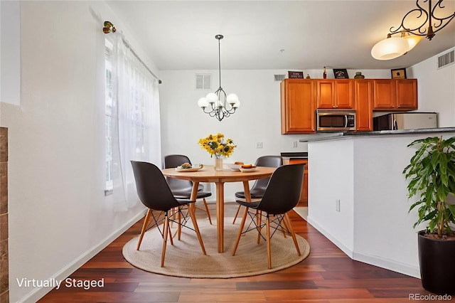 17442 Nature Walk Trl Unit 107, Parker, CO 80134 - dining room with wood finished floors and a chandelier