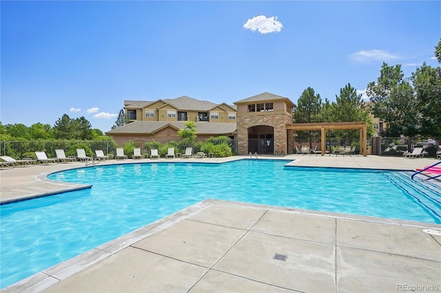 17442 Nature Walk Trl Unit 107, Parker, CO 80134 - community pool featuring a patio and a pergola