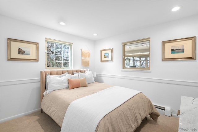 carpeted bedroom featuring a baseboard radiator, baseboards, and recessed lighting