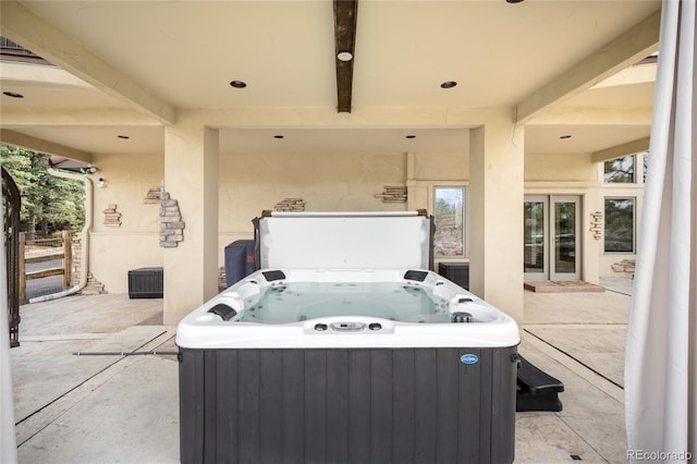 view of patio with a hot tub