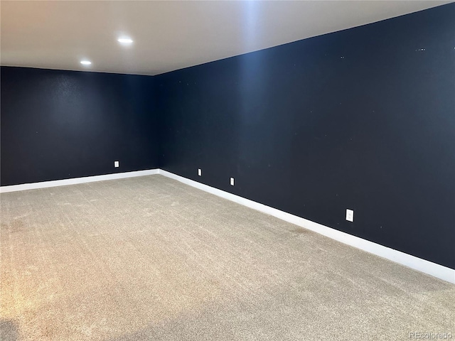 unfurnished room featuring carpet flooring