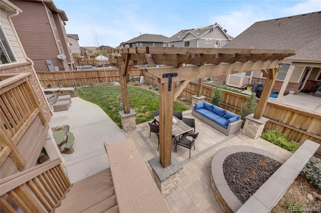 view of patio / terrace with a pergola, outdoor lounge area, a residential view, and a fenced backyard