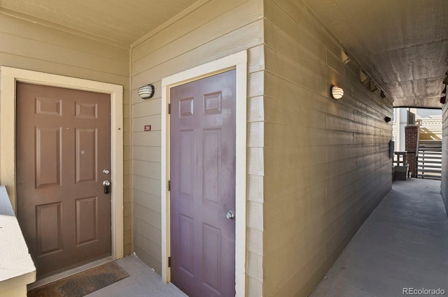 property entrance featuring covered porch